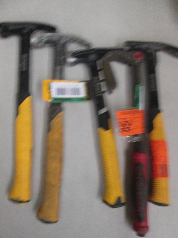 lot 254 image: 4 dewalt hammers and a cresent nail...