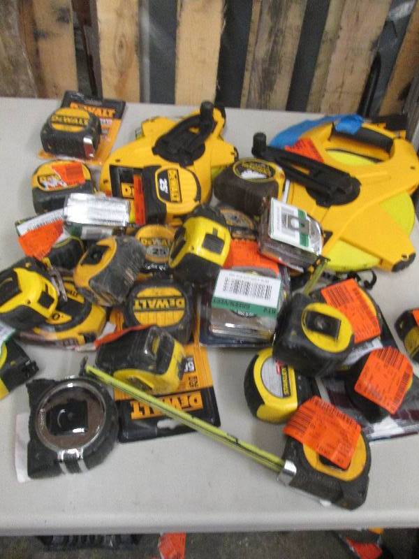 lot 304 image: lot of tape measures some work some...