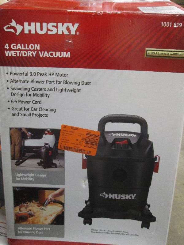 lot 318 image: husky 4 gallon wetdry vac open box...