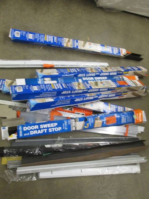 lot 373 image: big lot of door sweeps and draft st...