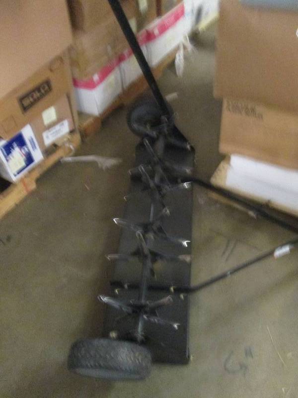 lot 395 image: brinly 40 pull behind plug aerator...