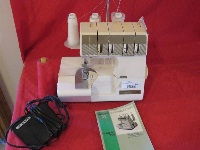lot 126 image: White Superlock Serger