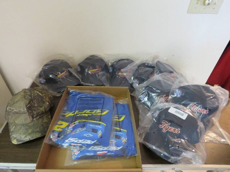 lot 629 image: Caps and T-Shirts