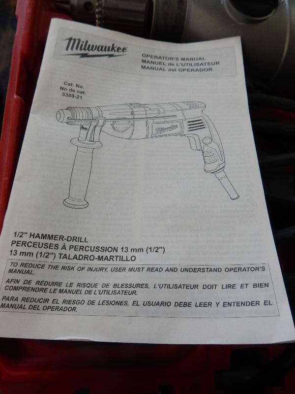 lot 61 image: Milwaukee 12 in Hammer Drill  Tested and Works