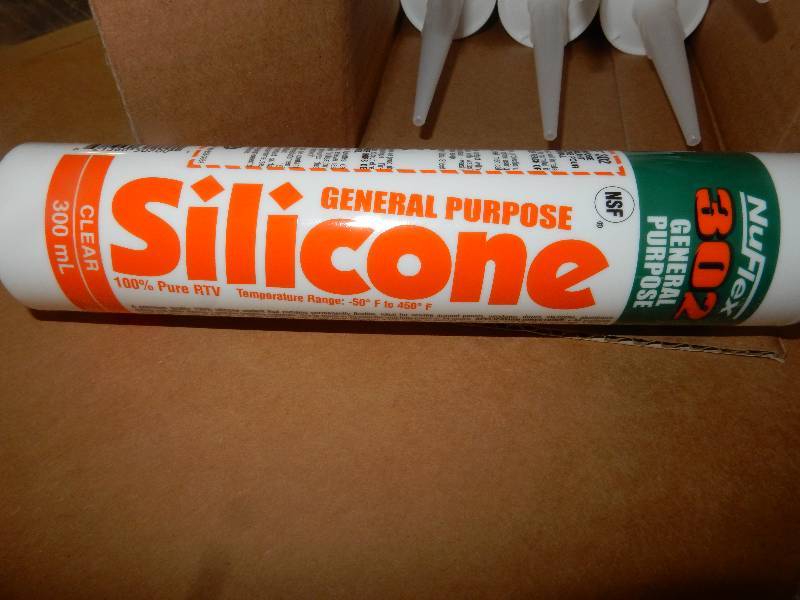 lot 102E image: NUFLEX 302 Silicone, 12 Tubes per box, 8 boxes in a lot (96tubes)