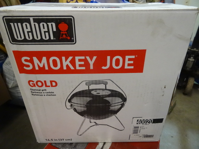 lot 8 image: NEW Weber Smokey Joe Gold Portable Charcoal Grill. Has dent in side (see picture). Retail $40