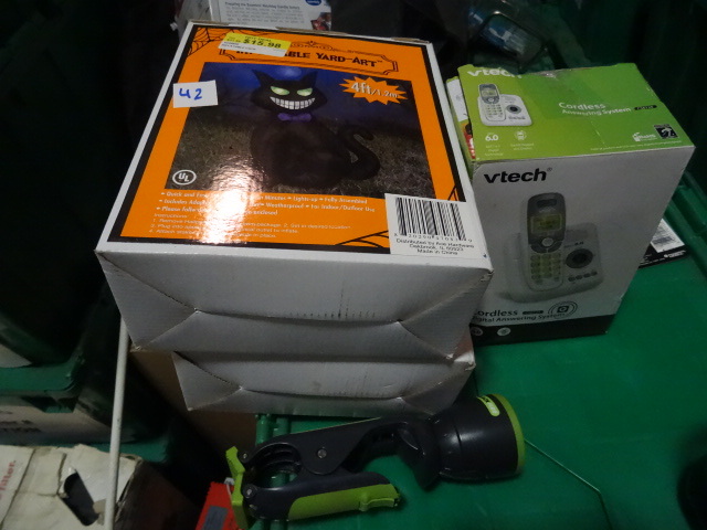 lot 42 image: NEW 4 Pc LOT incl. Qty 1 V-Tech Cordless Phone Model CS6124, Qty 1 LED Clamp Flashlight, Qty 2 Inflatable Yard Art 4 ft Black Cat. Toral Retail $119