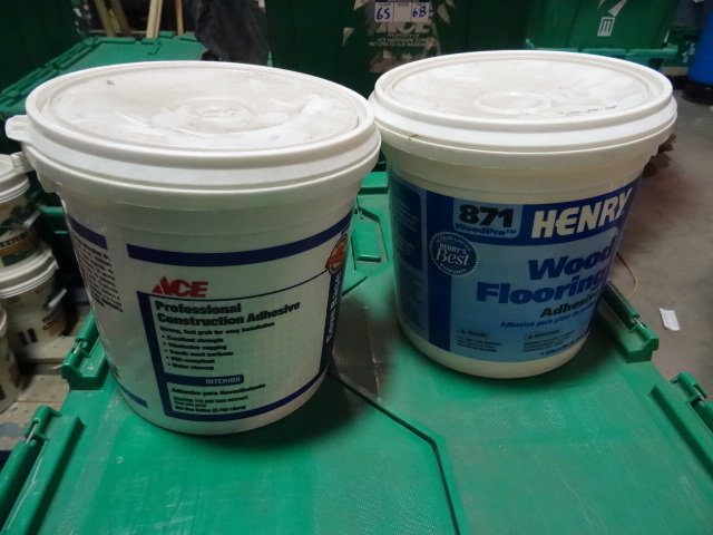 lot 71 image: NEW ENTIRE BIN Qty 3 Henry 871  Wood Flooring Adhesive and Qty 1 ACE Cove Base Adhesive. GREEN BIN NOT INCLUDED