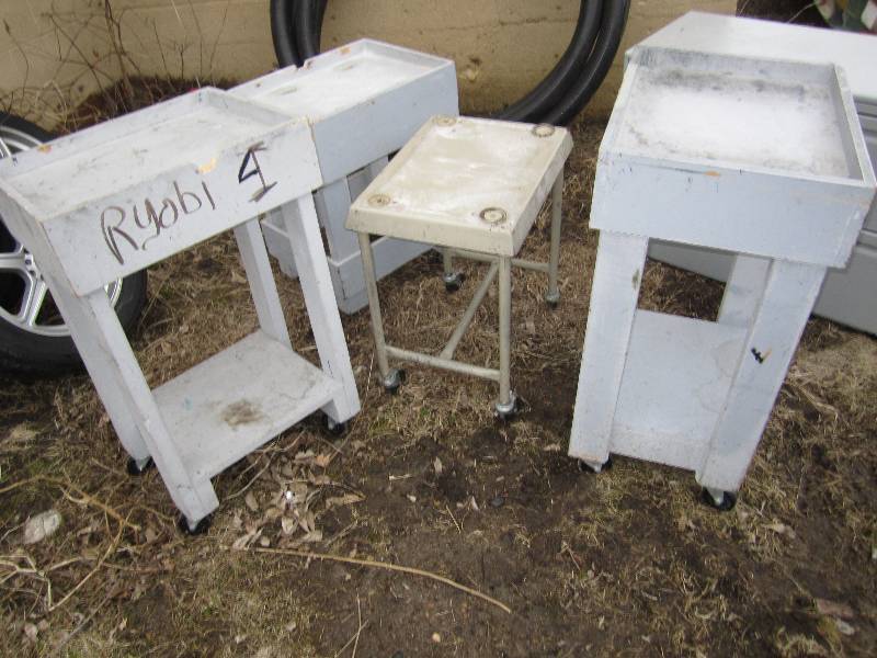 lot 41 image: 4 shop tables on wheels, various he...
