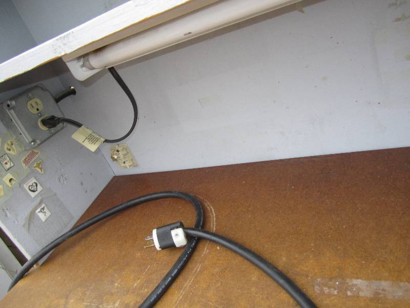 lot 52 image: work table with electrical outlets ...