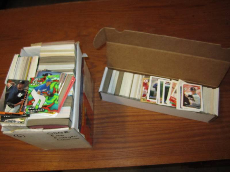 lot 10 image: 2 boxes of assorted sports cards...