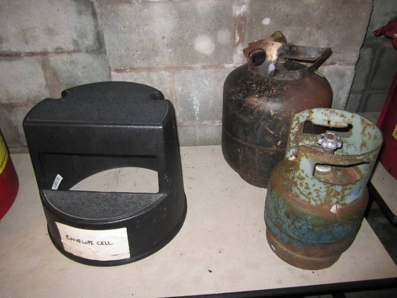 lot 15 image: 2  propane tanks and a foot stool...