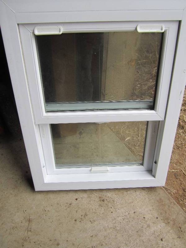 lot 24 image: Double pane vinyl framed window, 20...