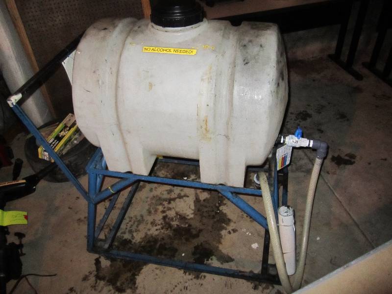 lot 29 image: 35 gallon tank mounted on wheeled m...
