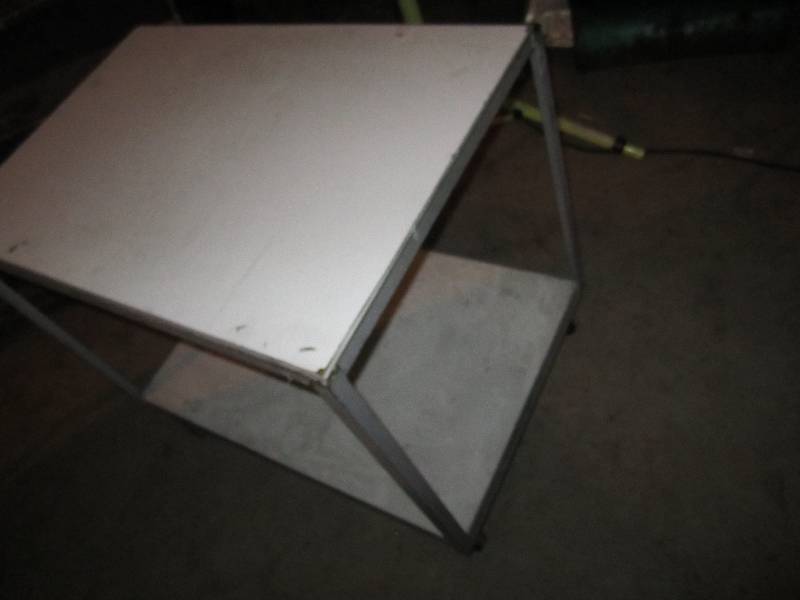 lot 66 image: 24 x 36 table on wheels...
