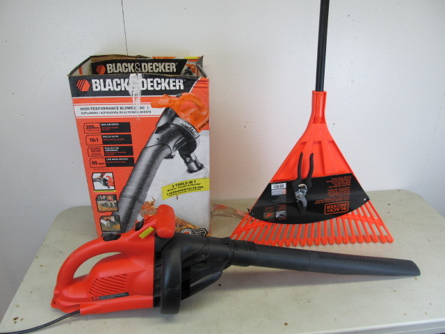 lot 12 image: Boxed Black & Decker Leaf Blower & New Rake