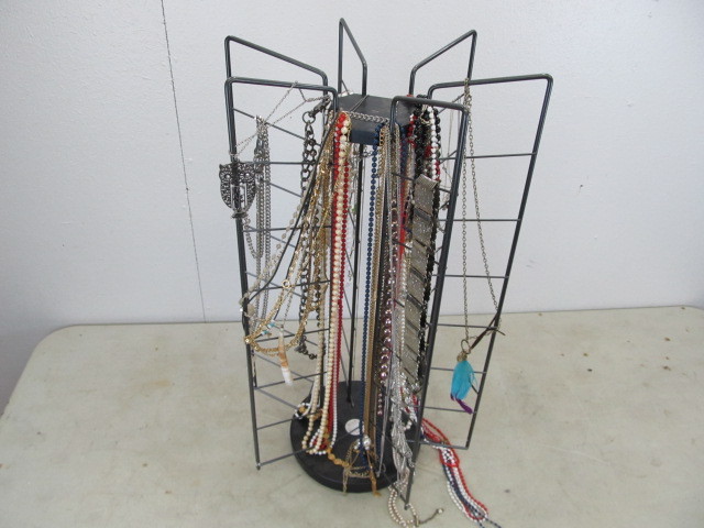 lot 35 image: Jewelry Display Rack wAssorted Necklaces Belts etc.
