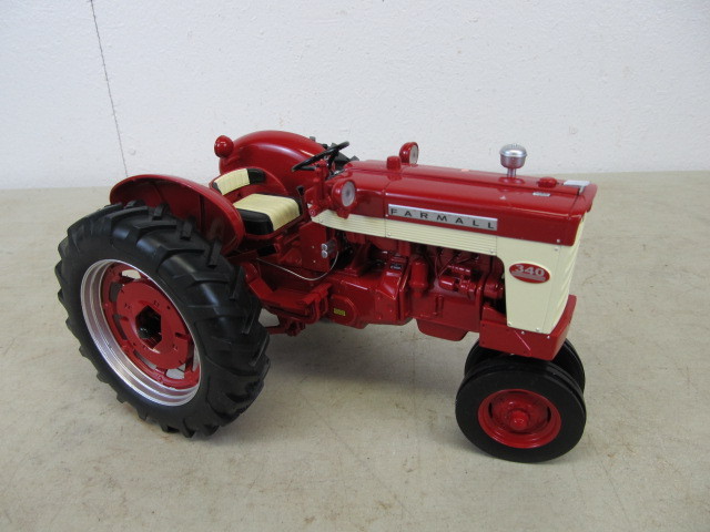 lot 57 image: Diecast Farmall IH Tractor