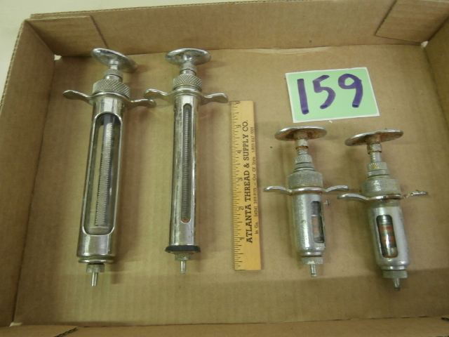 lot 159 image: Four Vintage Veterinary Syringes