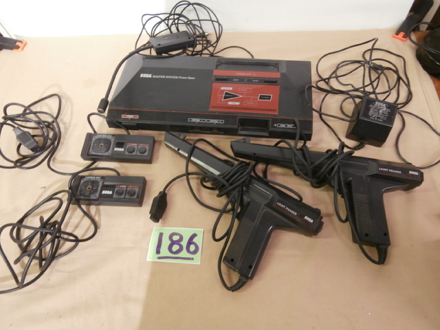 lot 186 image: Vintage SEGA Master SystemPower Base & More
