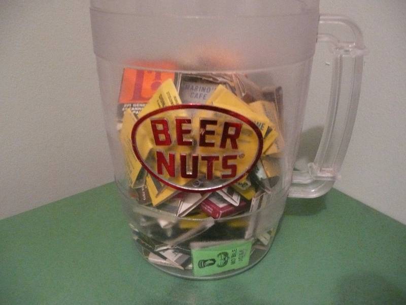 lot 21 image: Large Beer Nuts Mug - 10 Tall 6 Diameter - Filled With Vintage Matchbooks