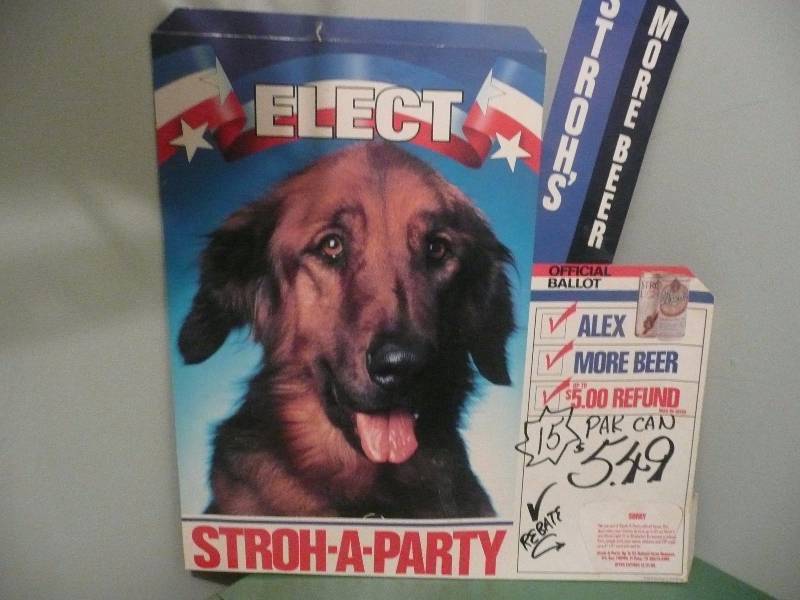lot 35 image: Vintage Elect Alex From Strohs Stroh-A-Party Easel Back Point Of Purchase Sign - Very Rare - Approx 22high 20wide