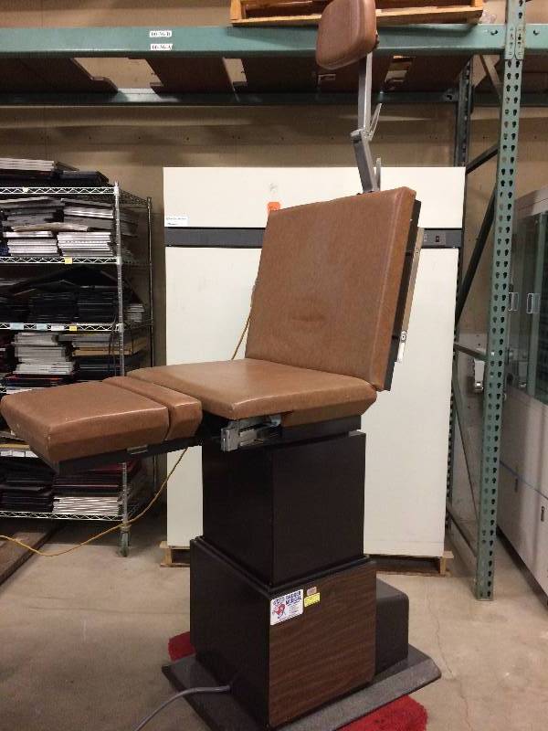 lot 52 image: Wow Retails Used $3000 Ritter Midmark X119 Power Adjustable Height & Tilt Surgical Exam Medical Procedure Table Chair With Retractable Stirrups - Excellent Working Condition - Slight Wear To Vinyl In Areas