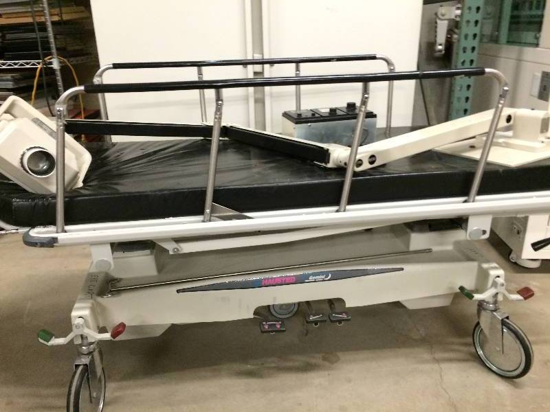 lot 55 image: Big WOW Retails Used $2500 Hausted Gemini Series All Purpose Surgical Transport Bed Patient Mobile Stretcher Or Gurney - Very Nice Condition - Wear To Head Cushion