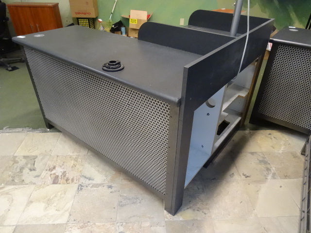 lot 1 image: L Shaped check out counter. 55 x 61 x 40. One drawer. Slot for cash drawer. Lighted sign
