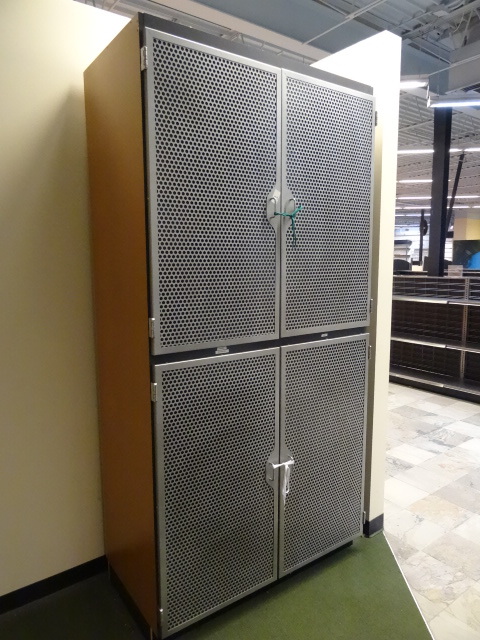 lot 3 image: 4 door cabinet. Laminate wood with metal doors. 48 x 25 x 96