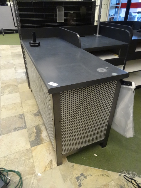 lot 9 image: L Shaped check out counter. 55 x 61 x 40. One drawer. Slot for cash drawer. Lighted sign