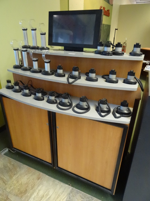 lot 10 image: Display cabinet. Used to display electronics. Each unit is monuted to a security device to detect theft. Built in monitor. SD slot for advertising. 48 x 24 x 48.