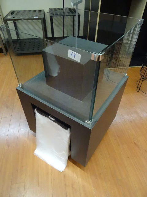 lot 24 image: Retail dump bin onwheels. Laminate construction. Glass top. 24 x 24 x 39