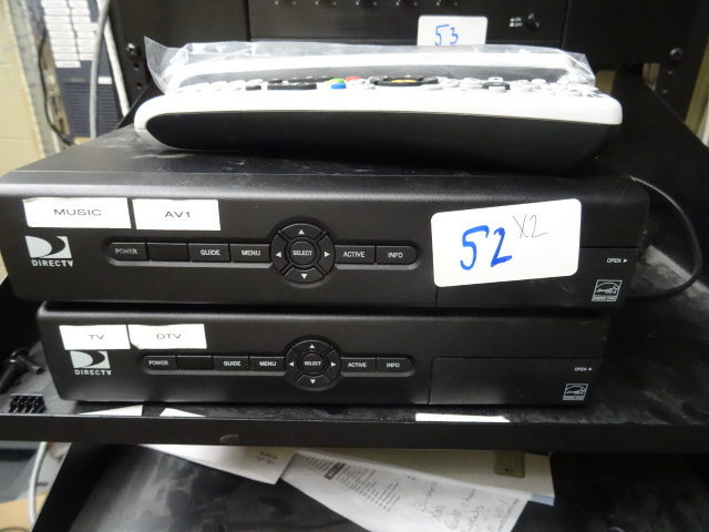 lot 52 image: 2 direct TV boxes with remotes. Model D12-100