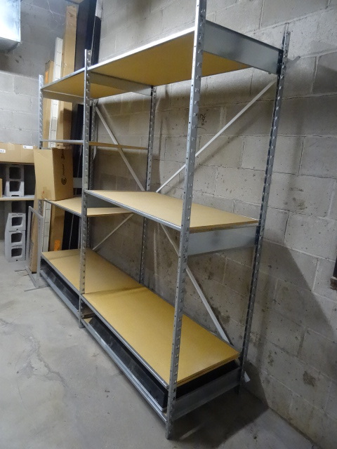 lot 98 image: 2 metal shelving units. Wood shelves. 16 total length. 24 x 84.
