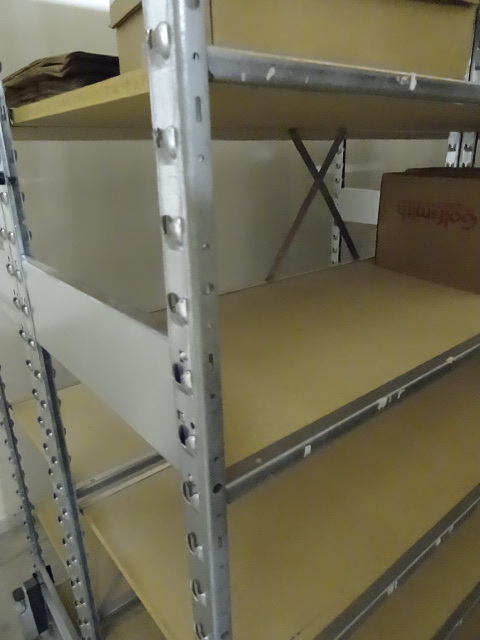 lot 106 image: Metal shelving unit. Wood shelves. 16 total length. 18 x 96. 28 shelves. No contents
