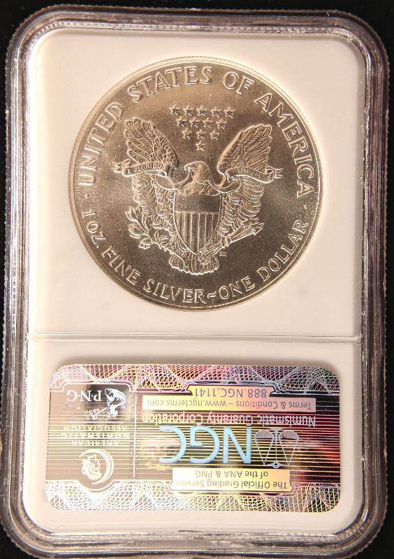 lot 20 image: 1986 AMERICAN SILVER EAGLE 1 TROY Oz. .999 FINE SILVER DOLLAR NGC MS69