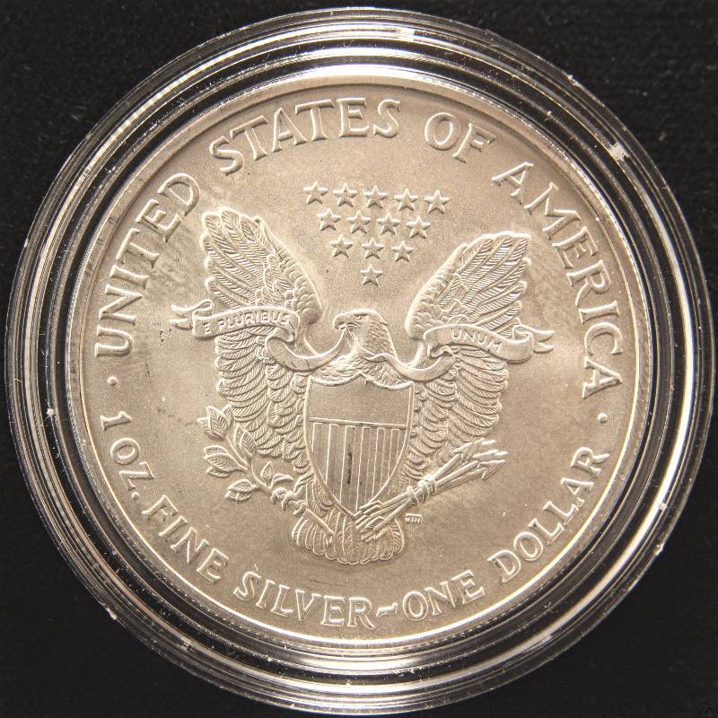 lot 77 image: 2005 AMERICAN SILVER EAGLE 1 TROY OZ. .999 FINE SILVER DOLLAR IN AIRTITE HOLDER