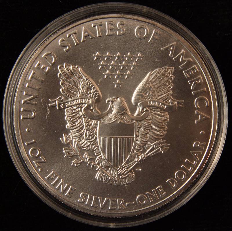 lot 98 image: 2011 AMERICAN SILVER EAGLE 1 TROY OZ. .999 FINE SILVER DOLLAR IN AIRTITE CAPSULE