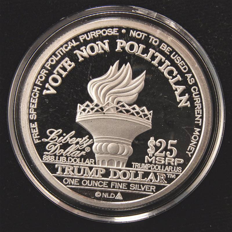 lot 2A image: 1 TROY OZ. .999 FINE SILVER DONALD TRUMP IN AIRTITE HOLDER