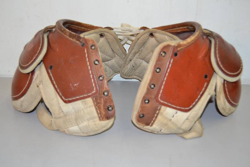 lot 21 image: Vintage Spalding Leather Shoulder Pads