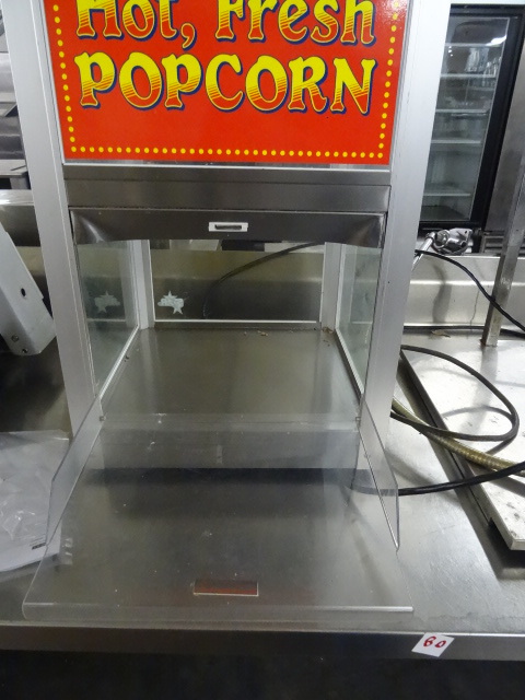 Hot fresh popcorn warming cabinet