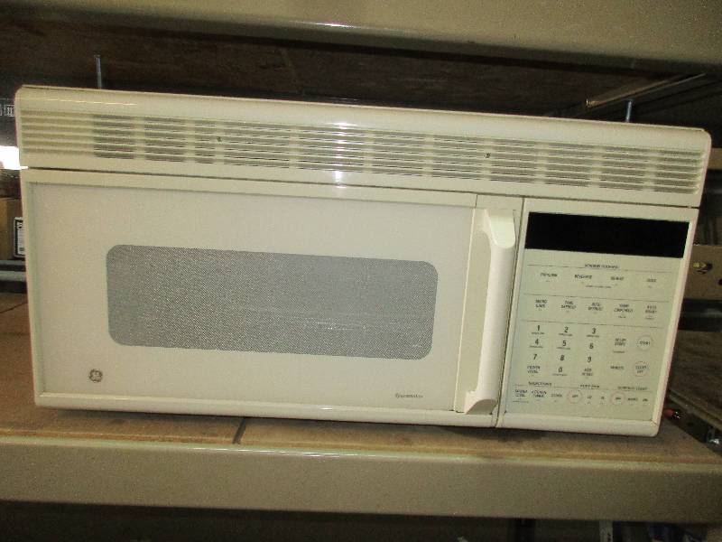 GE space maker microwave wrange hood - has mounting bracket