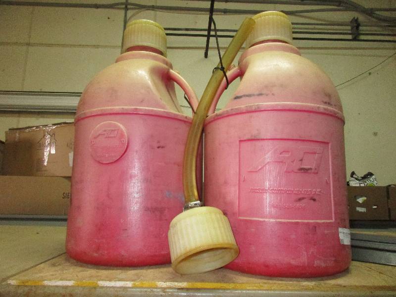 2 race gas cans w filler nozzle