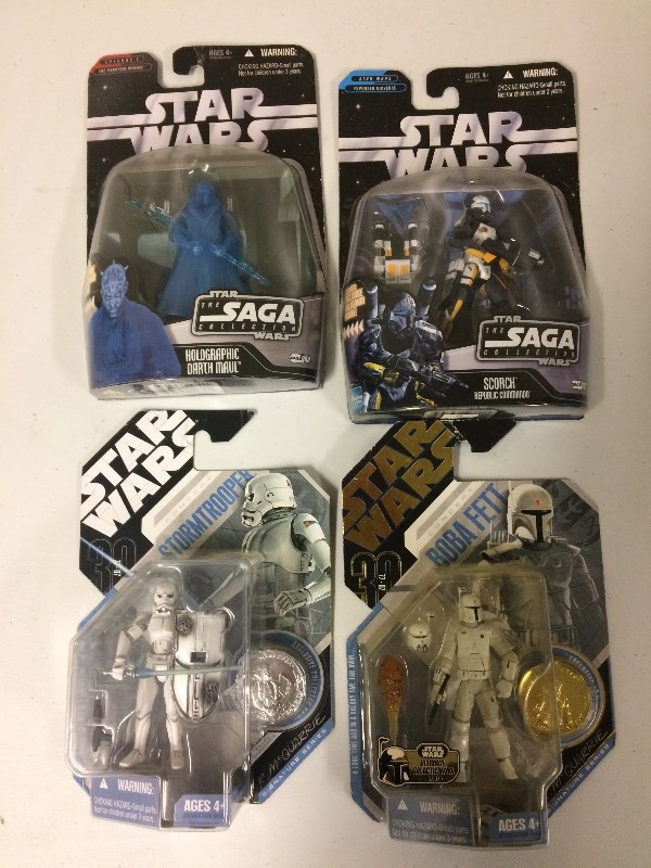 lot 71 image: 4 STAR WARS FIGURES IN PACKAGING