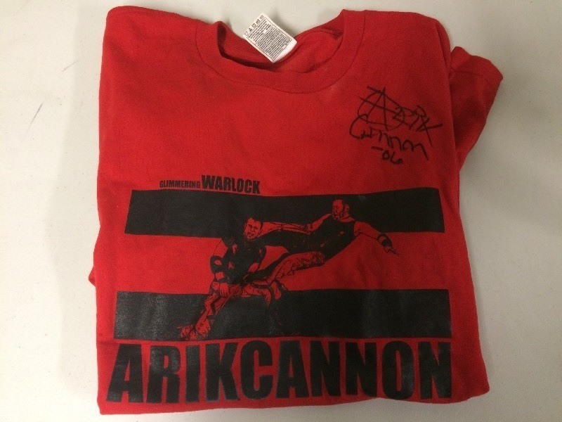 lot 122 image: XL AUTOGRAPHED ARICCANNON T SHIRT