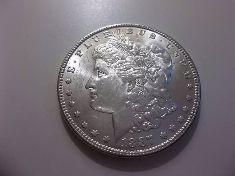 1887  Morgan Silver Dollar Higher Grade AU