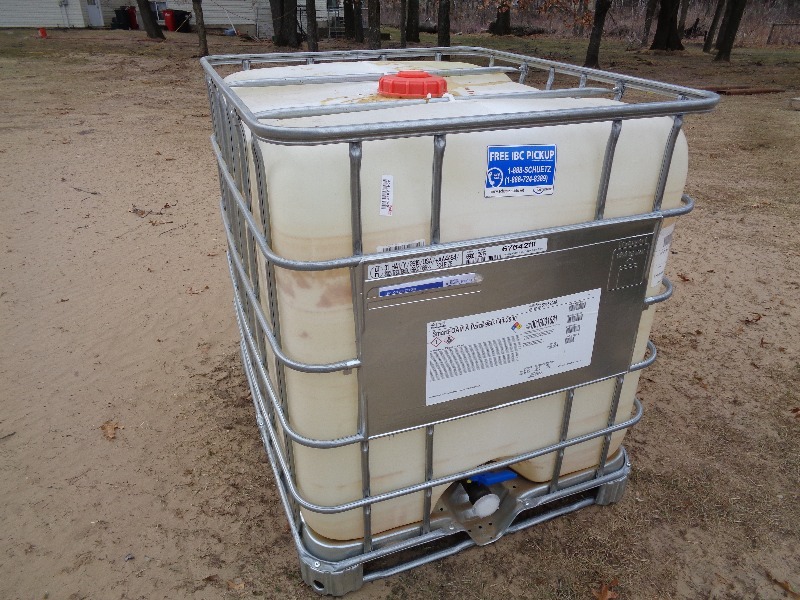 lot 57 image: 275 Gallon IBC Liquid Tote in Cage