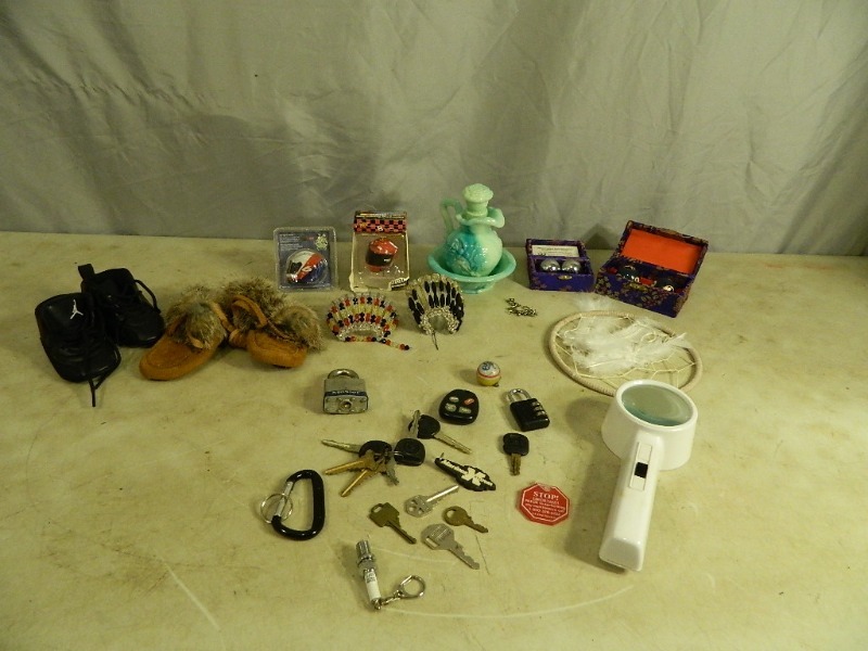 lot 24 image: Stress Relief Balls, Native American Items, Baby Air Jordans, and More