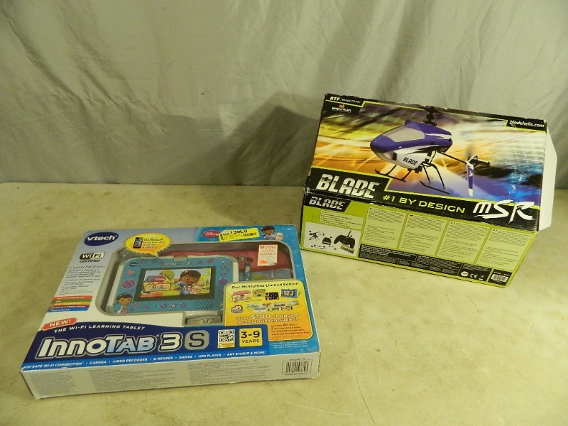 lot 46 image: VTech Kids Computer and Remote Controlled Helicopter